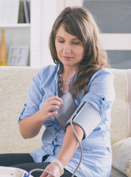 woman checking blood pressure